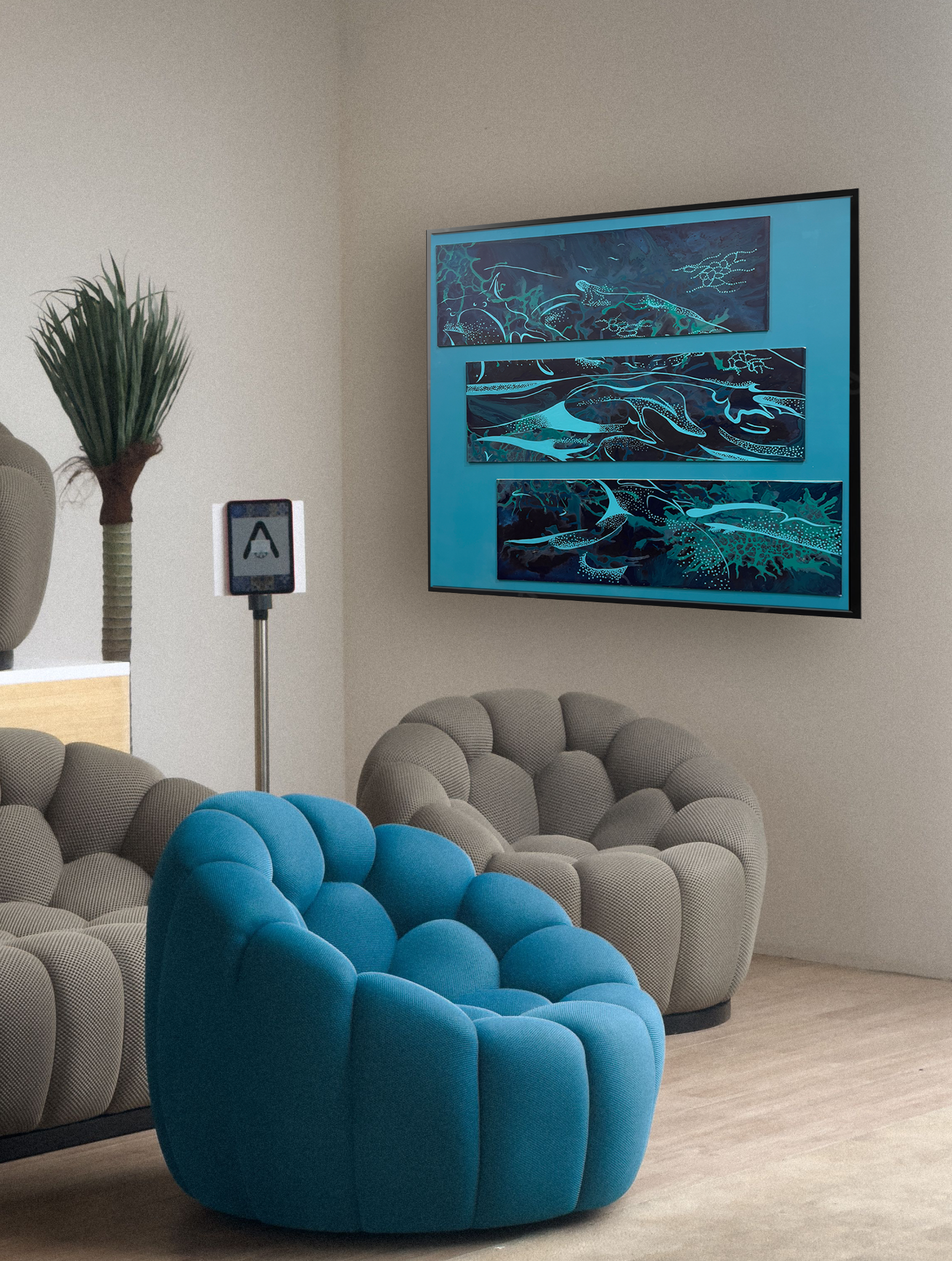Blue triptych artwork displayed in a contemporary seating space